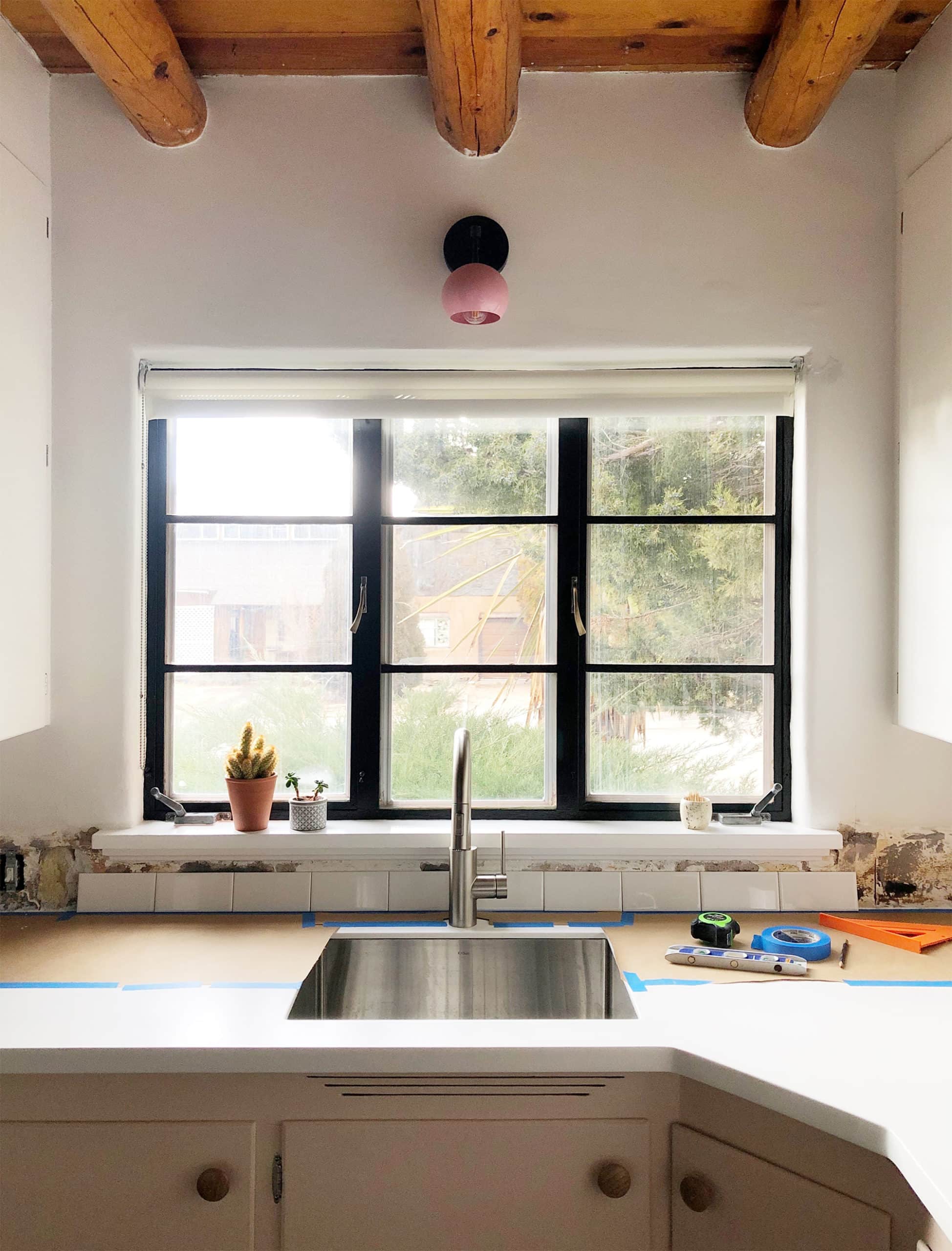 Installing a stacked bond subway tile backsplash