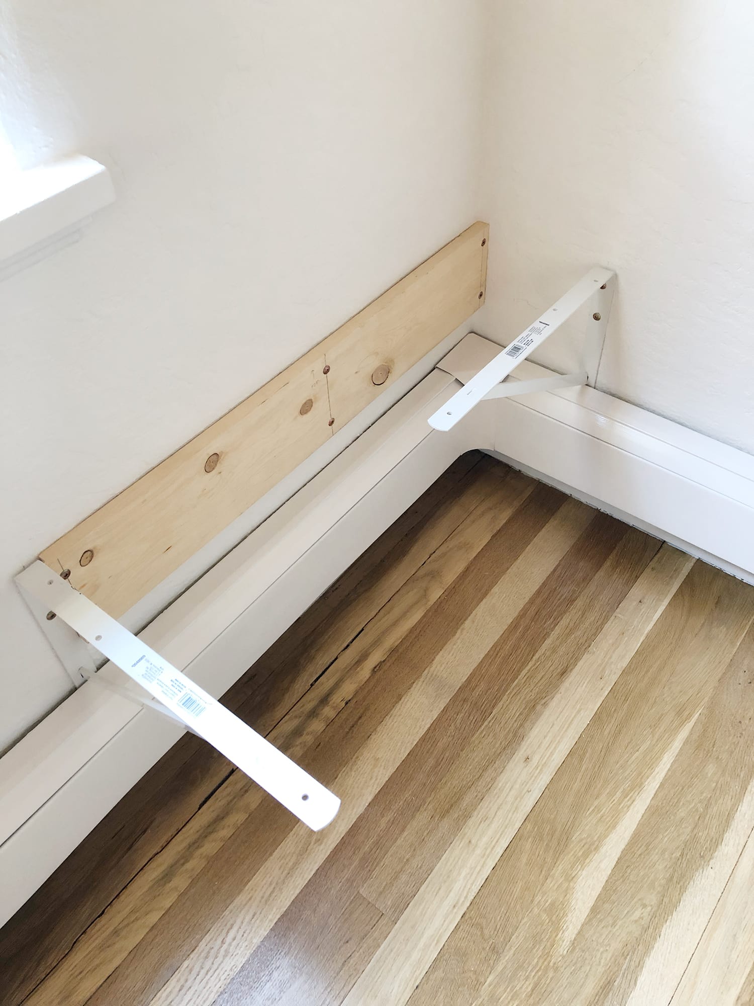 Installing a cleat to support a floating corner banquette